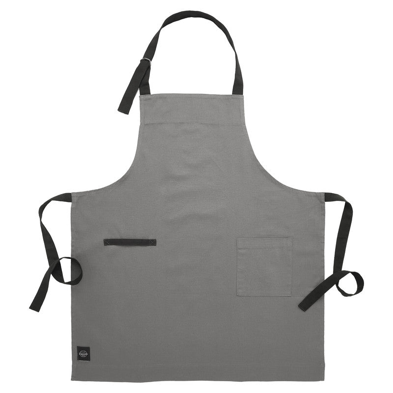 Heavy cotton grey kitchen apron laid flat, showing the tight weave and front pocket
