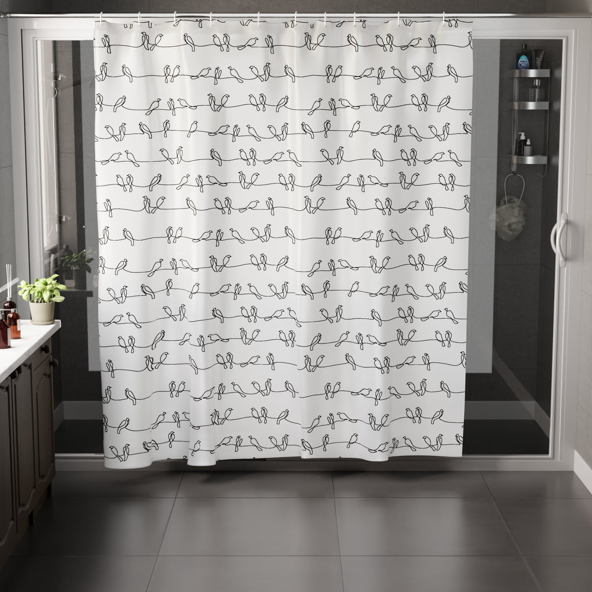 Rendered bathroom scene with a white shower curtain printed with black line-drawn birds hung across a glass shower cubicle